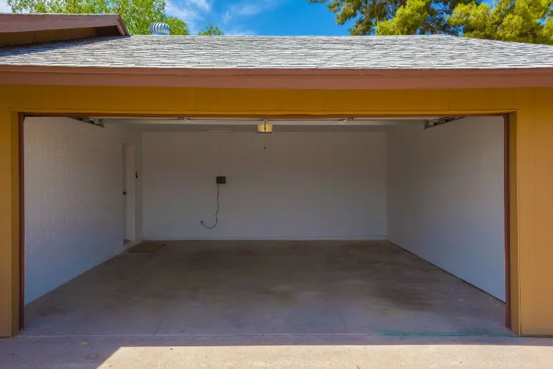 Single-car garage with a smooth, freshly finished concrete floor